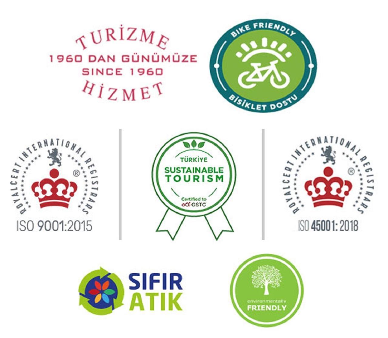 Akgun Istanbul Hotel Exterior foto The image displays several logos and certifications related to tourism and sustainability. Here’s a description of the key elements:

1. **Tourism Service Logo**: Features the Turkish text "TURİZM 1960 DAN GÜNÜMÜZE" meaning "Tourism from 1960 to Pres